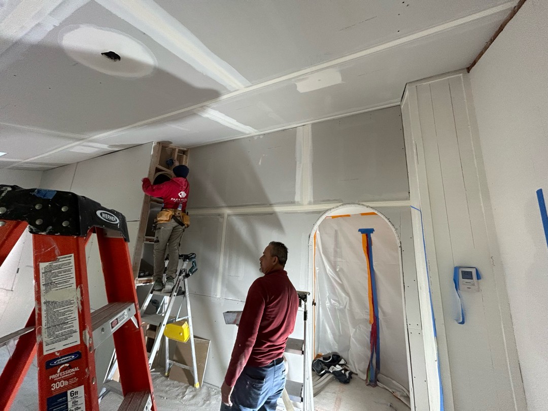 The Fast Patch Drywall team working on a Seattle ceiling repair